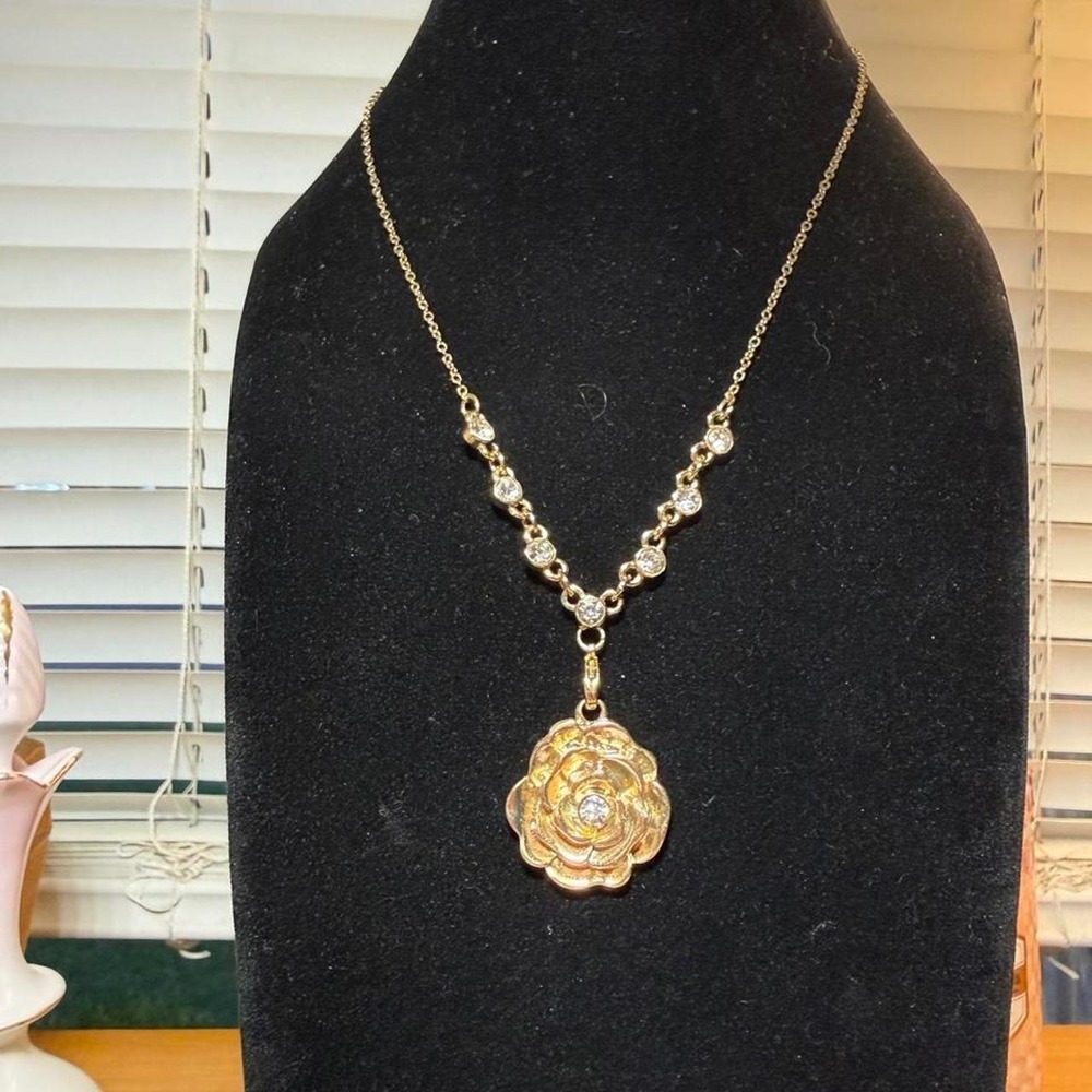 Gold rose pendant necklace with crystal accents